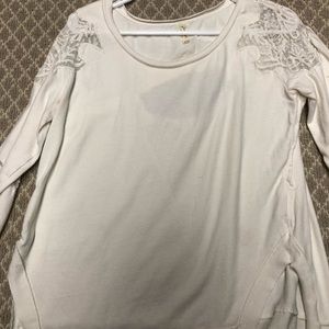 Feee People white opens back sweatshirt. Size M